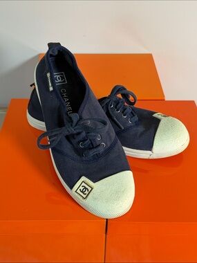 CHANEL Navy Canvas Lace-Up Sneakers with Cream Cap Toe
